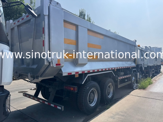 SINOTRUK HOWO 371HP 8X4 Tiếc xe tải tháo dỡ Xây dựng Mặt trước cũ Bơm quân sự Cho khu vực khai thác mỏ Hai đèn cảnh báo Thùng chứa loại U